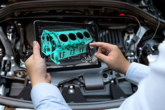 A model of a car engine on a tablet