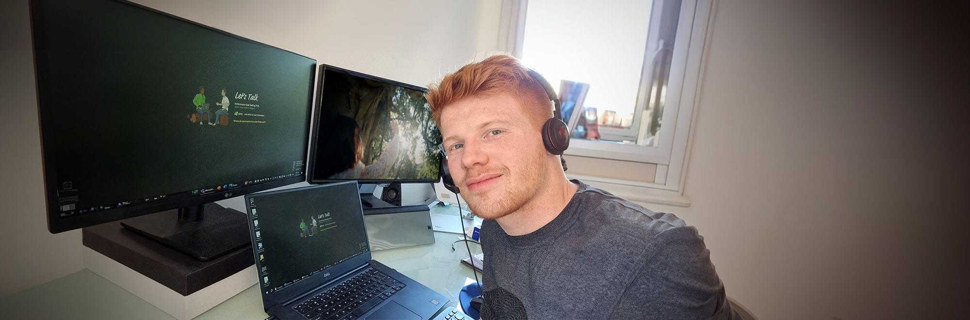 Presenter, Benjamin Marsh at his work from home set up ready to  present podcast. 